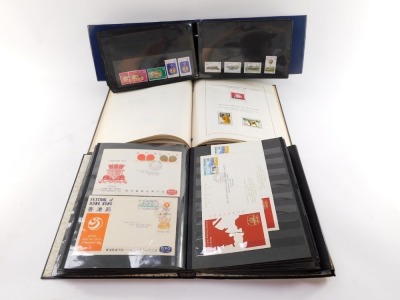 Philately. Hong Kong mint and used, together with first day covers, in three albums. - 2