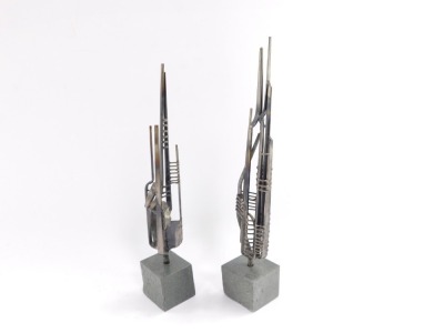 A pair of modern metal sculptures, raised on serpentine bases, 27cm and 30cm high. - 2