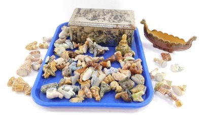 Wade Whimsies, animals, fish and birds, etc., together with nursery rhyme figures and Flintstones dinosaurs, together with metal casket.