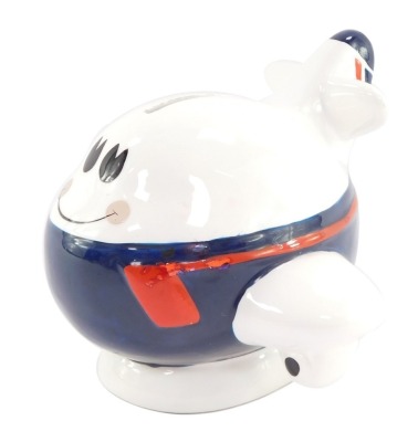 A British Airways pottery novelty money box, modelled as a cartoon jumbo jet, circa 1987, printed marks, 14.5cm wide. (AF)