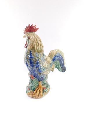 A pottery figure of a cockeral, indistinct monogram to base, 42cm high. - 2