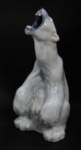 A Royal Copenhagen porcelain figure of a polar bear, number 502, printed and painted marks, 32.5cm high.