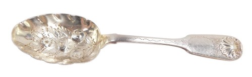 A Victorian silver fruit spoon, fiddle and shell pattern with engraved decoration, John Aldwinckle and Thomas Slater, London 1887, 2.6toz.