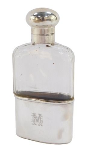 A George V cut glass and silver hip flask, monogram engraved, with a screw hinged lid, London 1925, 12.5cm high.