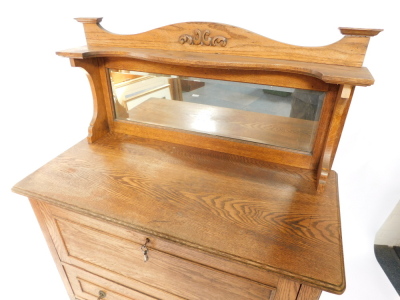 A Victorian Art Nouveau mirror back sideboard, with a drop flap opening to reveal a single shelf, over two frieze drawers, raised on block feet, 148cm high, 101cm wide, 48cm deep. - 2