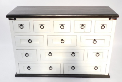 A black and white painted kitchen chest, with an arrangement of thirteen long and deep short drawers, each with black ringed handles, raised on a plinth base, 83cm high, 201cm wide, 43.5cm deep.