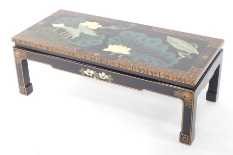 A Chinese black and gilt lacquer coffee table, of rectangular form, the top painted with birds and flowers, raised on square legs, 36cm high, 101.5cm wide, 46cm deep.