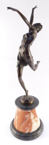 After Bruno Zach (Austrian, 1891-1945). A bronze sculpture of a dancing woman, raised on a black and veined marble base, a7255, 63cm high.