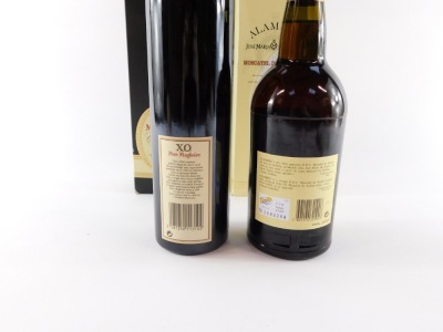 A bottle of Pere Magloire Xo Calvados, together with a bottle of Alambre Jose, Jose Maria Da Fonseca Moscatell Desetubla, both boxed. (2) - 2