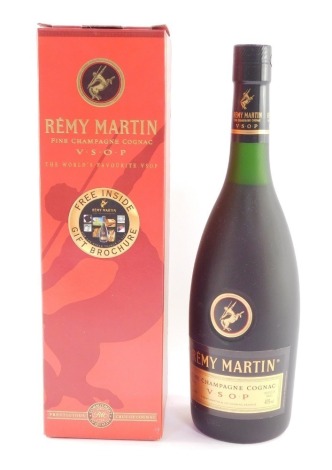 A bottle of Remy Martin Fine Champagne Cognac, boxed.