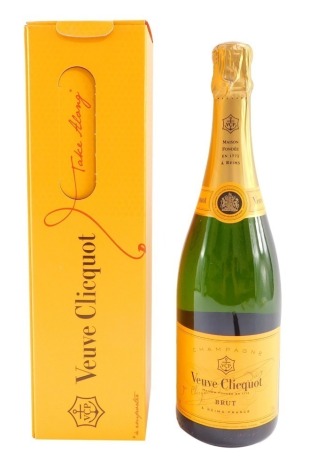 A bottle of Veuve Clicquot champagne, boxed.