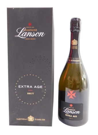 A bottle of Lanson champagne, extra aged, boxed.