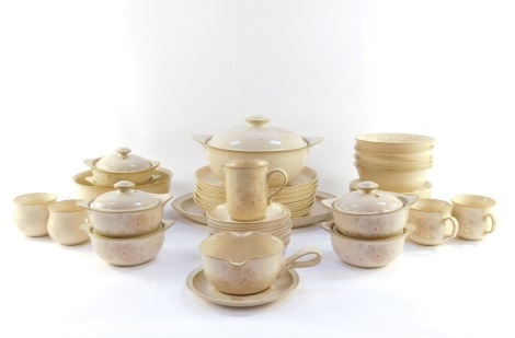 A Denby pottery part dinner and tea service decorated in the Maplewood pattern, comprising oval meat platter, vegetable tureen and cover, salad bowl, six dinner and side plates, six soup bowls and five covers, five dessert bowls, sauce boat on stand, crea