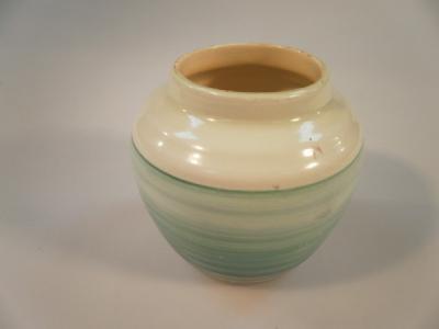 A Shelley green glazed turned baluster vase