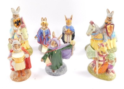 Seven Royal Doulton The Arthurian Legends Bunnykins figures, comprising, Sir Galahad two figures of Sir Lancelot on horseback, Merlin, King Arthur, Queen Guinevere and Sir Gawain. (7)