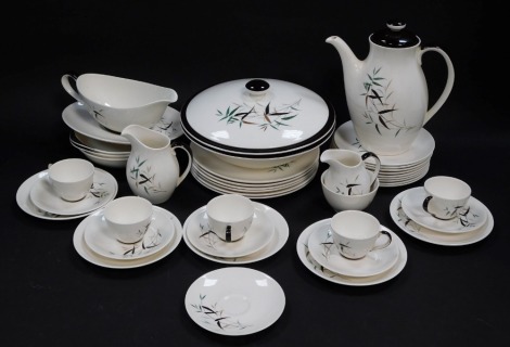 A Royal Doulton pottery part coffee service decorated in the Bamboo pattern, comprising coffee pot, milk and cream jugs, sugar bowl, five coffee cups, six saucers and five plates, together with a part dinner service, comprising pair of vegetable tureen an