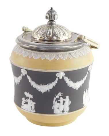 A Wedgwood late 19thC two tone Jasperware biscuit barrel, sprigged with classical figures and floral festoons against a dark brown ground, within mocha borders, the upper border decorated with acanthus leaves, with plated mount swing handle and lid, impre