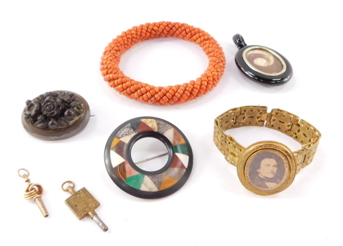 Victorian costume jewellery, including a jet hair locket pendant, specimen agate brooch, silver and lava cameo brooch, coral bangle and two watch keys. (a quantity)