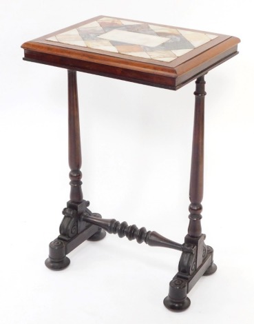 A Victorian rosewood and specimen marble occasional table, with an inlaid rectangular top, over a pair of turned columns, on four pad feet united by a turned stretcher, 95cm high, 48cm wide, 39cm deep.