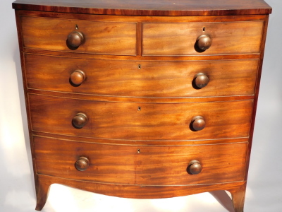 A late Georgian mahogany bowfront chest, with a plum pudding mahogany top, two short over three long graduated drawers, raised on outswept feet, 106cm high, 106cm wide, 52.5cm deep. - 3