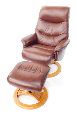 A Global Alliance Mandalay swivel recliner chair, in brown leather with a matching stool. (2)