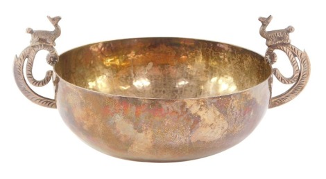 A silver twin handled bowl, probably South American, the scrolling handles surmounted with alpacas, stamped silver 925, 4.6toz.