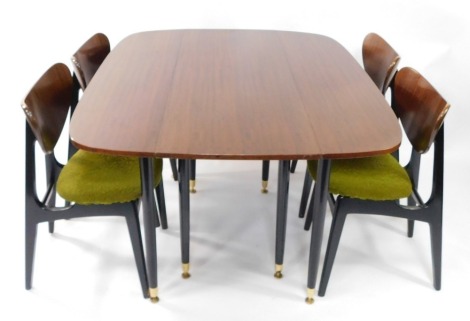 A G-Plan 1950's teak drop leaf dining table, 71cm high, 132cm wide, 107cm, extended, 46cm deep, together with four single dining chairs, with green foliate fabric seats and ebonised frames. (5)