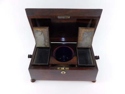 A Regency rosewood tea caddy, of sarcophagus form, the hinged lid opening to reveal a central recess flanked by two canisters, raised on bun feet, 19cm high, 34cm wide, 18cm deep. - 3