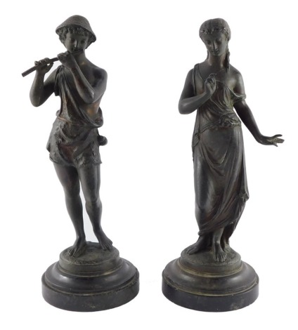 A pair of spelter late 19thC figures modelled as Daphnis and Chloe, raised on black marble socles, signed R Richard, 30cm high.