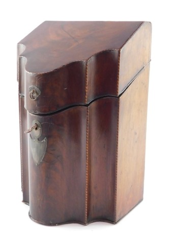 A George III mahogany serpentine knife box, boxwood strung, opening to reveal a fitted interior, with key escutcheon and key, 34.5cm high, 22cm wide, 18.5cm deep.