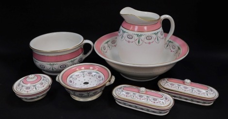 A Minton late 19thC seven piece wash set, decorated in the Adam style with paterea, ribbons and hare bell swags, number D2533, painted and printed marks, comprising wash jug and bowl, chamber pot, sponge, soap dish, cover and drainer, and a pair of toothb