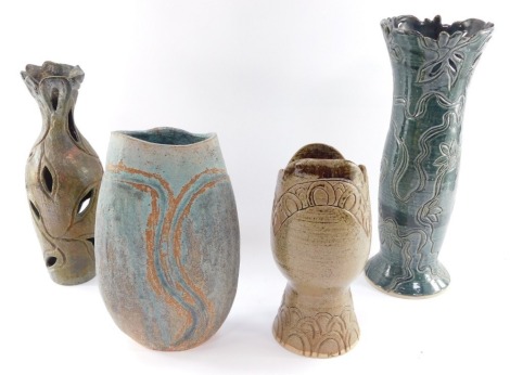 Four studio pottery vases by Karen Cohen, each with incised decoration, bears labels, 27cm-40cm.