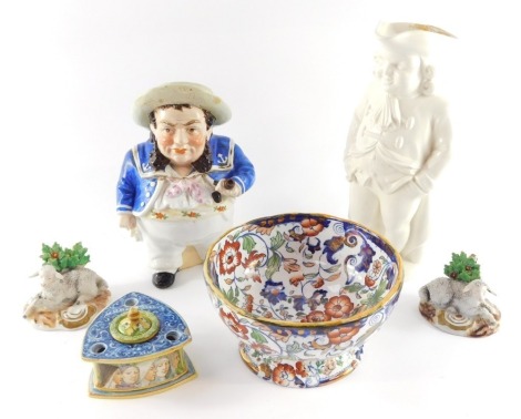 A Jacob Petit porcelain tobacco jar and cover, modelled as a sailor, Minton white salt glazed character jug, pair of Samson Derby porcelain figures of sheep, fluted lustre bowl and a Majolica inkwell painted with portraits. (6, AF)