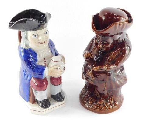 A Staffordshire pearlware early 19thC character jug, modelled as a seated Toby, with jug of frothing ale and pipe, together with a brown treacle glaze character jug and cover, modelled as The Snuff Taker. (2, AF)