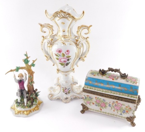 A Capodimonte porcelain figure of boy on a swing, designed by Gipellati, printed and painting marks, 57cm high a 19th century Paris porcelain vase of twin handled baluster rococo form, decorated with sprays of pink flowers, 43cm high (AF), together with a