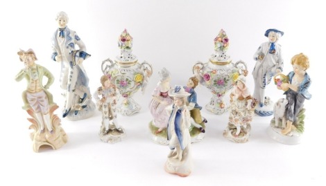 A group of 19thC and later porcelain figures, chiefly gallants and ladies, together with a pair of porcelain vases moulded with putti, painted and encrusted with flowers (10)