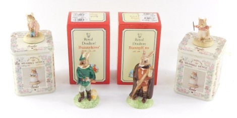 A pair of Royal Doulton Bunnykins figures, the Robin Hood Collection, modelled as Little John, and Robin Hood, boxed, together with two Border Fine Arts Brambly Hedge figures, modelled as Wilfred Teddy Mouse and Wilfred Jigging, with tins. (4)