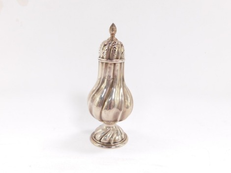 An Edward VII silver sugar sifter, of spiral fluted baluster form, London 1912, 4.3toz.