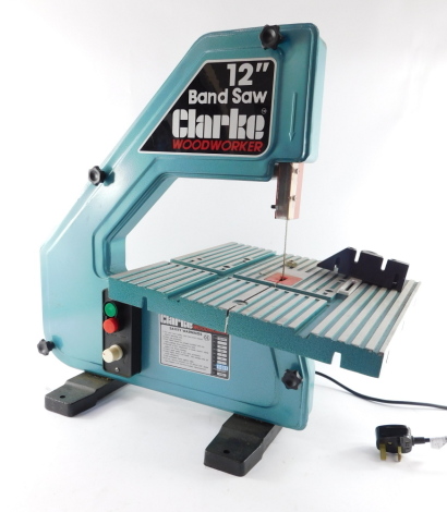 A Clarke Woodworker 12" electric band saw, Model BS-300.