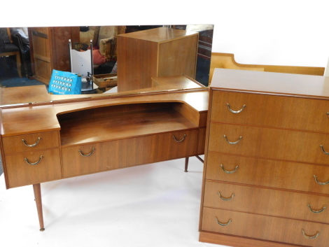 A mid century bedroom suite, comprising a Meredew teak chest of five long drawers, raised on a plinth base, 100cm high, 76cm wide, 46cm deep, a dressing table with a rectangular glass mirror over a shelf, one long drawer flanked by four short drawers, rai