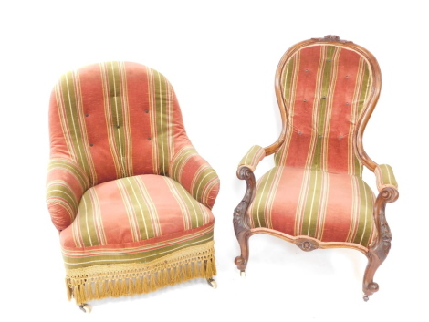 A Victorian mahogany spoon back nursing chair, upholstered in red and green striped fabric, with foliate carved scrolling arms, over cabriole legs, on castors, together with a Victorian tub nursing chair upholstered in the same fabric, raised on turned le