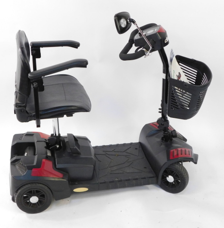 A Drive mobility scooter, with battery and instruction leaflet.