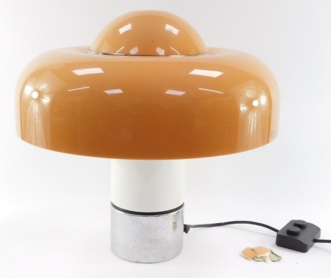 A Harvey Guzzini Brumbury 1970's metal and plastic table lamp, with an acrylic shade, bears label Harveiluce, Made In Italy, 46cm high, 44cm diameter. (AF)This lot contains untested or unsafe electrical items.  It is supplied for scrap or re-conditioning 