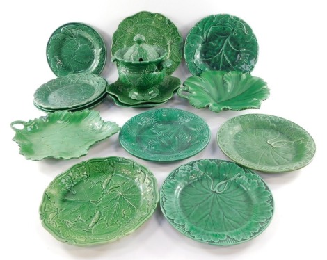 A group of 19thC green leaf majolica plates, leaf shaped dishes and a sucrier and cover. (a quantity)