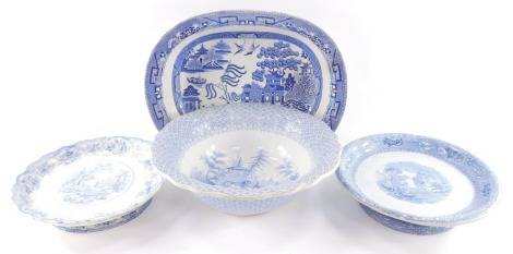 An early 19thC ironstone cake stand decorated in the Fairy Villas pattern, together with a Davenport blue and white cake stand, decorated with a romantic scenery pattern, blue and white wash bowl decorated in the Zoological pattern, and a Willow pattern o