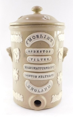 A Moslin's stoneware water filter, The Boston Filter Company, England., sprigged with floral motifs, 43cm high.