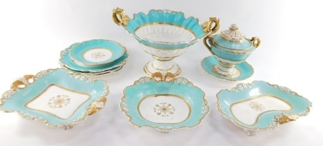 A Davenport early 19thC porcelain part dessert service, moulded with flowers, against a turquoise ground, gilt heightened, comprising a twin handled comport, sauce tureen, two covers and a stand, three shaped dishes, and three plates. (AF)