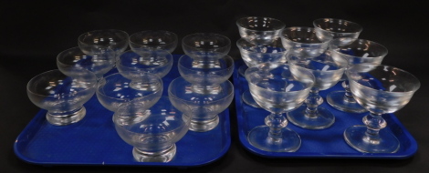 A set of eight heavy cut glass sundae dishes, together with ten further sundae dishes.