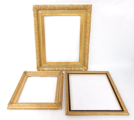 A 19thC gilt wood and gesso picture frame, aperture 81cm x 59cm, frame 105cm x 93cm, another with a velvet slip, aperture 78cm x 63.5cm, frame 93cm x 79cm, and a further frame, aperture 51cm x 61cm, frame 70cm x 83cm. (3)