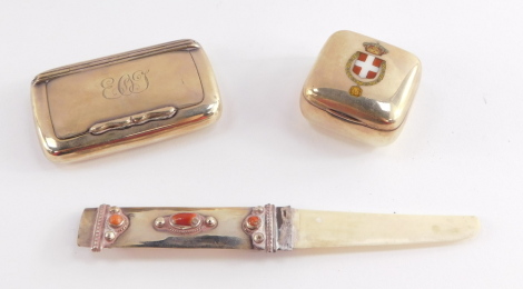 A George V silver snuff box, monogram engraved, Birmingham 1913, a pill box, white metal and enamel, possibly depicting the Serbian Order of Karadorde, and a ivory paper knife with a white metal and cabochon set handle, 3.0toz all in.